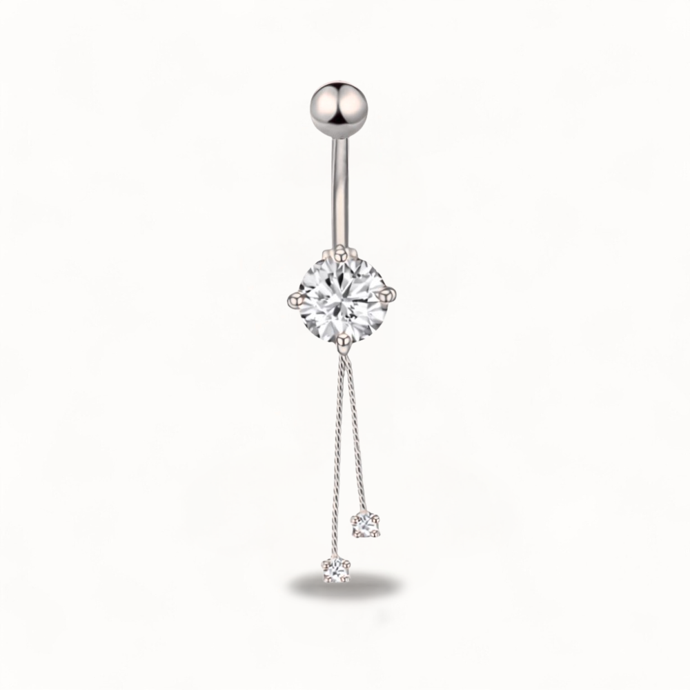 Dangling belly button piercing with chain